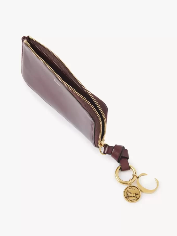 Alphabet wallet in shiny leather Alphabet wallet in shiny leather