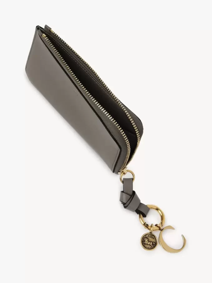 Alphabet wallet in shiny leather Alphabet wallet in shiny leather