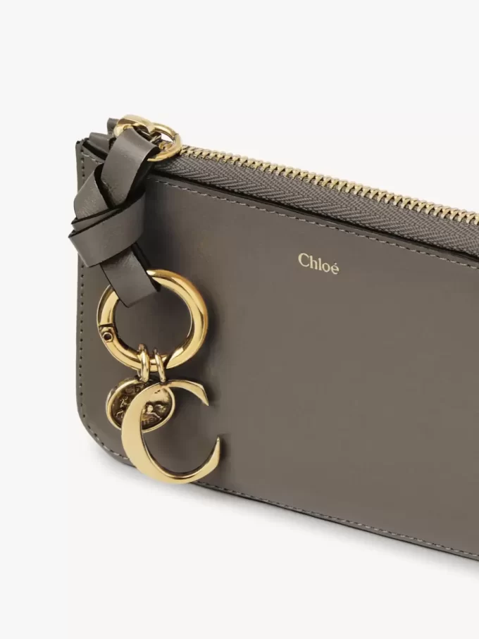 Alphabet wallet in shiny leather Alphabet wallet in shiny leather