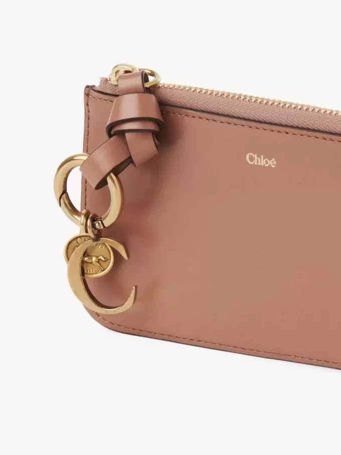 Alphabet wallet in shiny leather Alphabet wallet in shiny leather