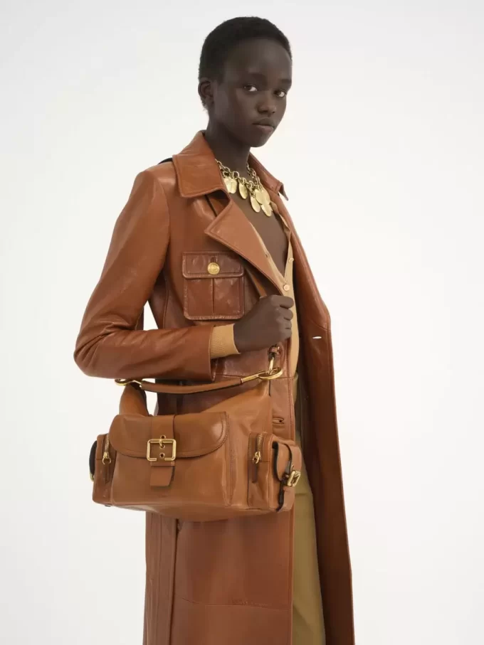 Camera bag in shiny leather Camera bag in shiny leather