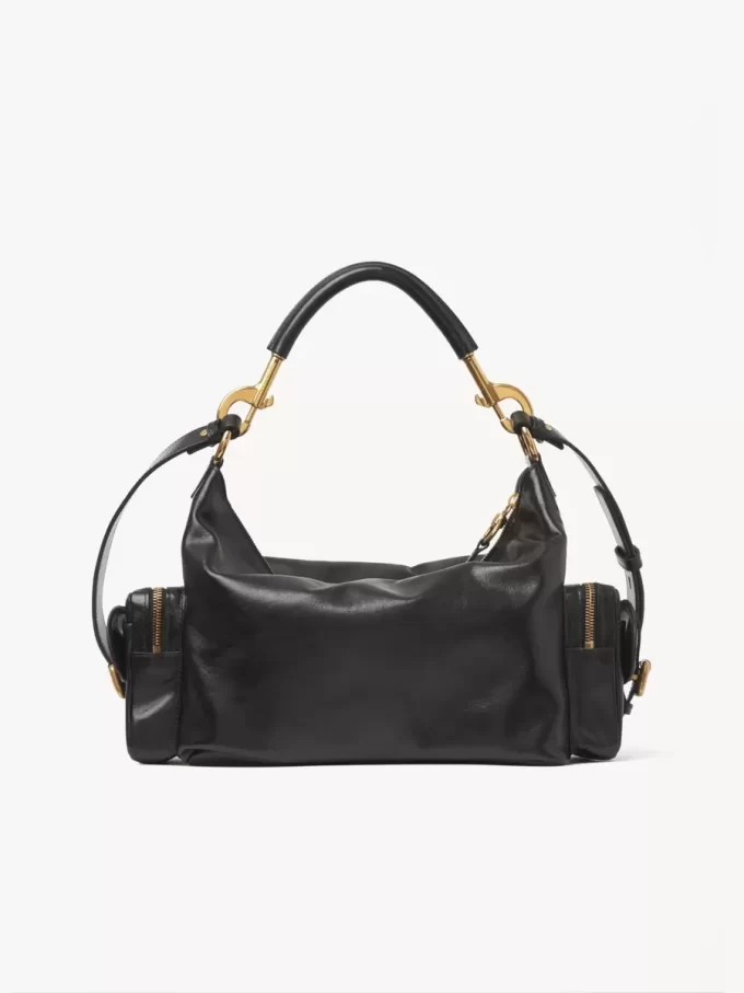 Camera bag in shiny leather Camera bag in shiny leather