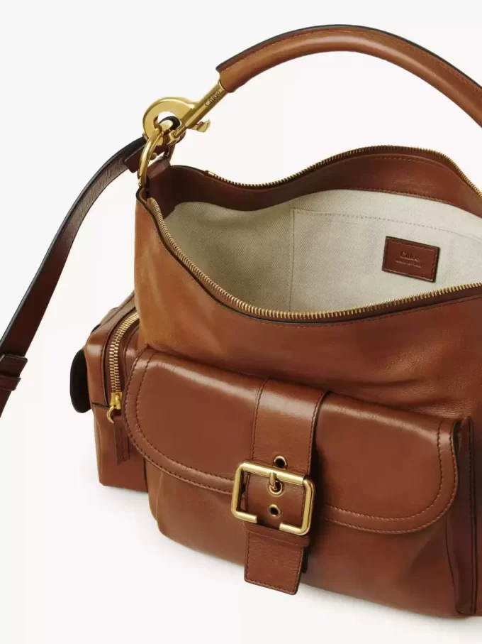 Camera bag in shiny leather Camera bag in shiny leather