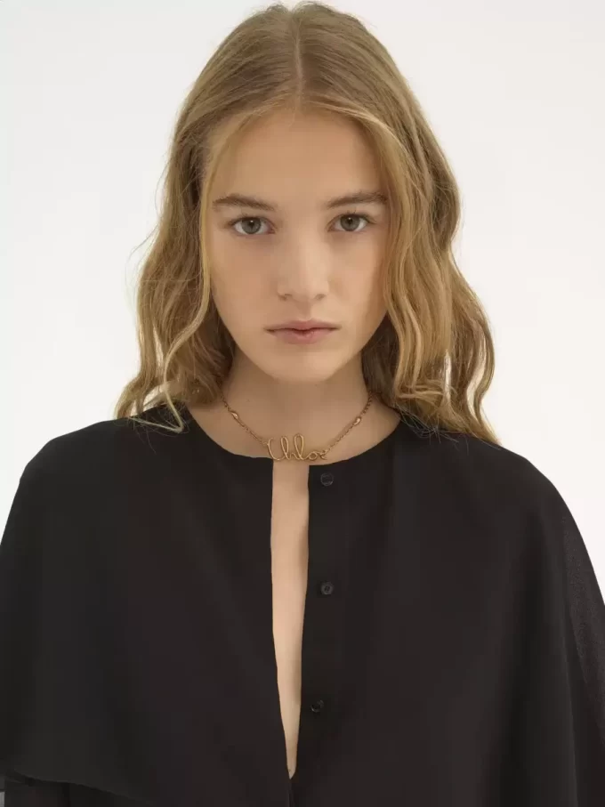 Cape blouse in silk georgette Cape blouse in silk georgette