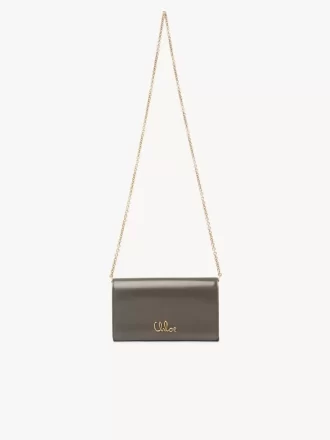 chlo iconic flap wallet on chain in shiny leather 1 330x440 - Chloé Iconic flap wallet on chain in shiny leather