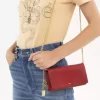 Chloé Spin flap wallet on chain in grained leather Chloé Spin flap wallet on chain in grained leather
