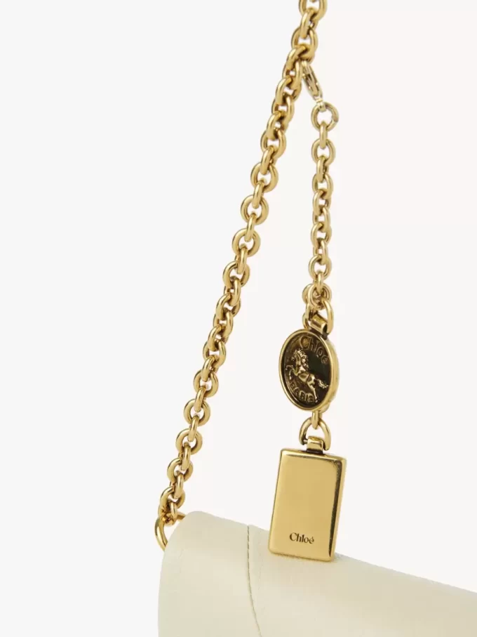 Chloé Spin flap wallet on chain in grained leather Chloé Spin flap wallet on chain in grained leather