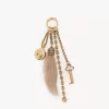 Chloé Symbols bag charm in brass & shearling Chloé Symbols bag charm in brass & shearling