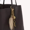 Chloé Symbols bag charm in brass & shearling Chloé Symbols bag charm in brass & shearling