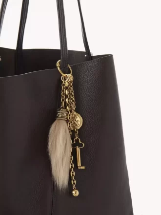 Chloé Symbols bag charm in brass & shearling