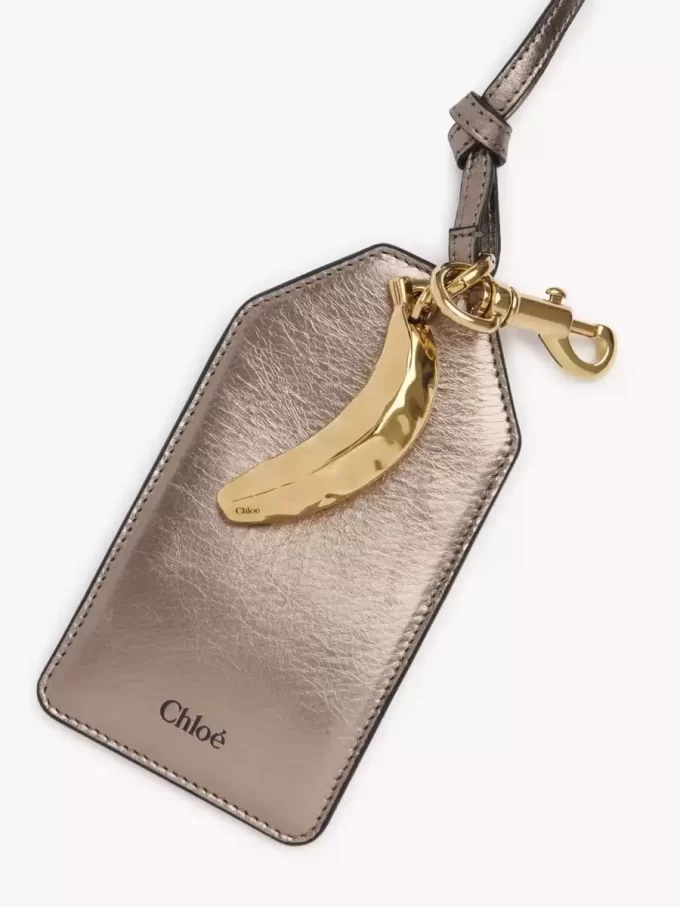 Chloé Symbols Banana tag in metallized leather Chloé Symbols Banana tag in metallized leather