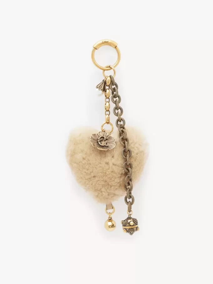 Chloé Symbols Heart Shearling bag charm in brass Chloé Symbols Heart Shearling bag charm in brass
