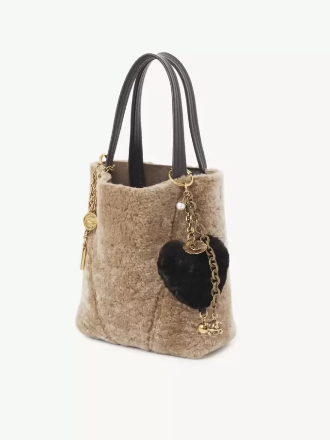 Chloé Symbols Heart Shearling bag charm in brass Chloé Symbols Heart Shearling bag charm in brass