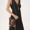Château Treasures chain flap bag in grained leather Château Treasures chain flap bag in grained leather