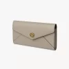 Envelope long wallet with flap in grained leather Envelope long wallet with flap in grained leather