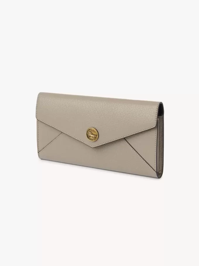Envelope long wallet with flap in grained leather Envelope long wallet with flap in grained leather