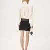Fitted mini skirt in a wool & cashmere knit Fitted mini skirt in a wool & cashmere knit