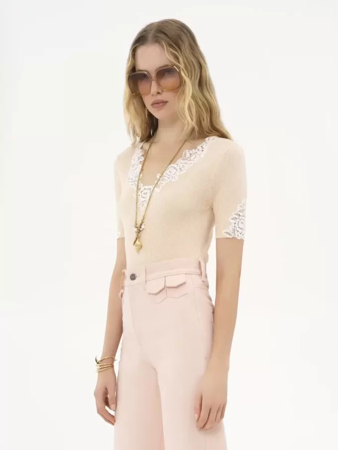 Fitted short-sleeve top in guipure lace wool knit Fitted short-sleeve top in guipure lace wool knit