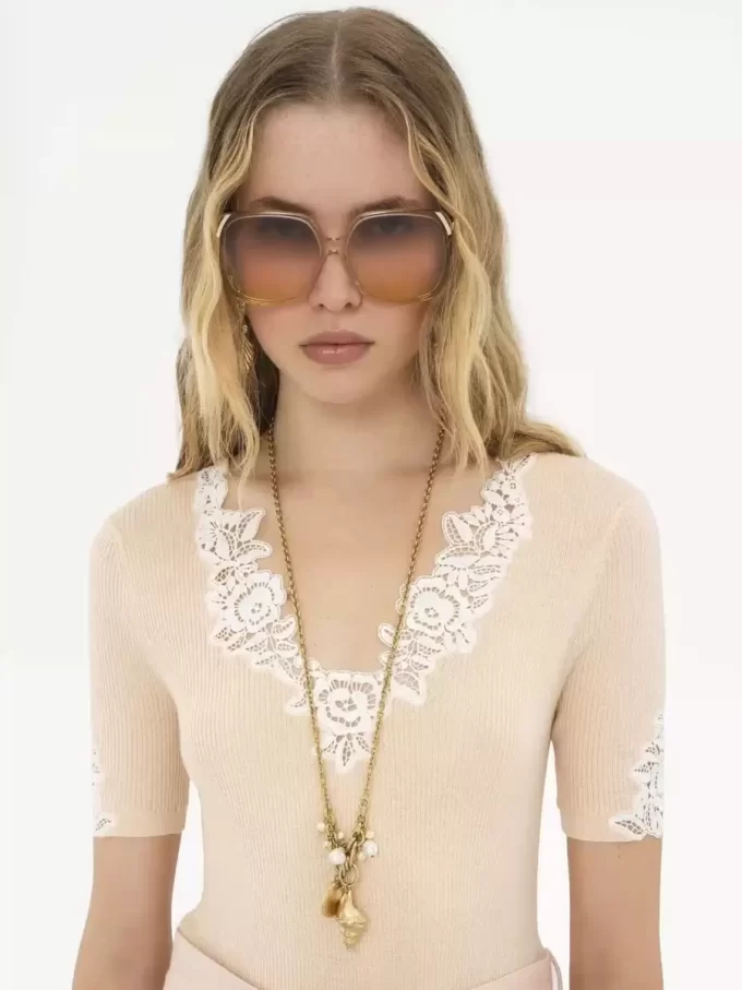Fitted short-sleeve top in guipure lace wool knit Fitted short-sleeve top in guipure lace wool knit