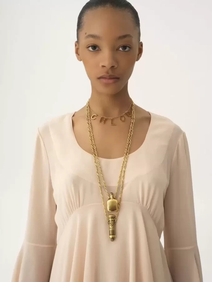 Flared mini dress in silk georgette Flared mini dress in silk georgette