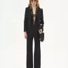 Flared tailored pants in wool gabardine Flared tailored pants in wool gabardine