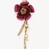 Flower bag charm in raffia & metal Flower bag charm in raffia & metal