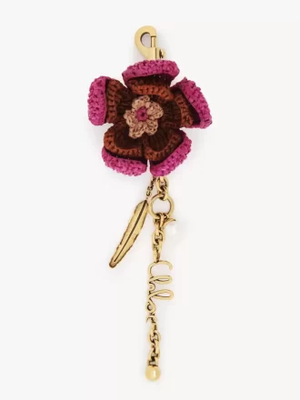 Flower bag charm in raffia & metal