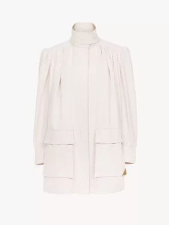 High-neck utilitarian jacket in cotton canvas High-neck utilitarian jacket in cotton canvas