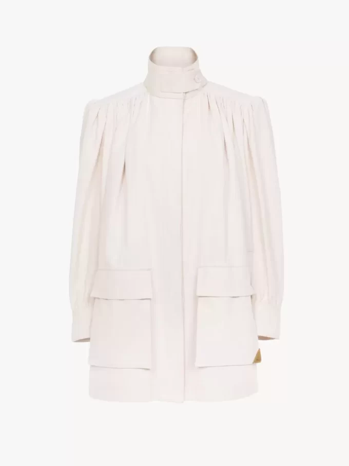 High-neck utilitarian jacket in cotton canvas High-neck utilitarian jacket in cotton canvas