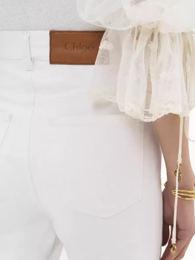 High-rise flare jeans in denim High-rise flare jeans in denim