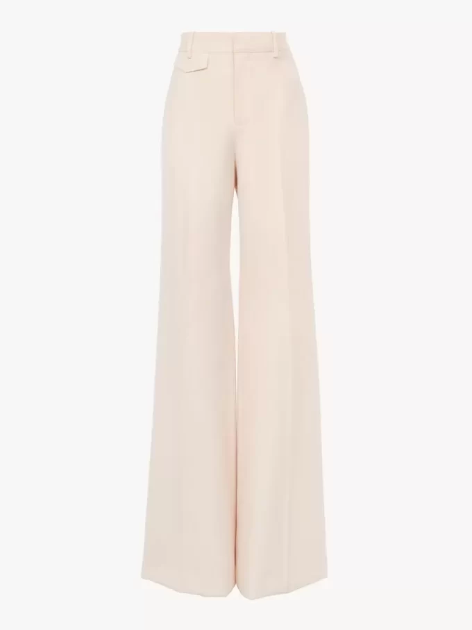 High-rise flared pants in wool gabardine High-rise flared pants in wool gabardine