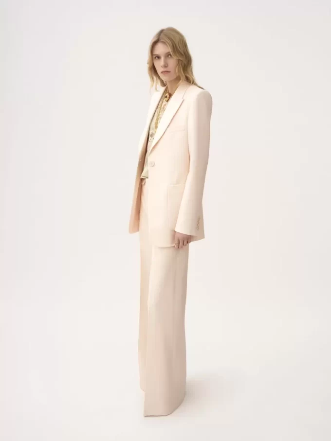 High-rise flared pants in wool gabardine High-rise flared pants in wool gabardine