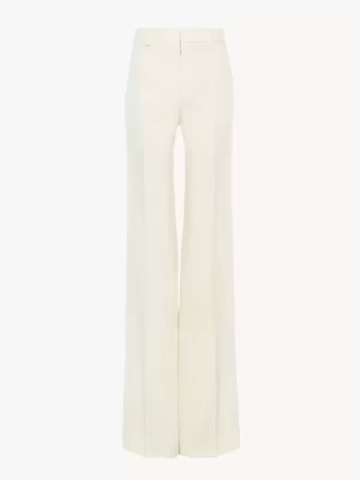 High-rise flared pants in wool grain de poudre