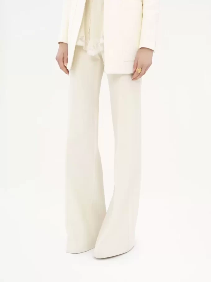 High-rise flared pants in wool grain de poudre High-rise flared pants in wool grain de poudre