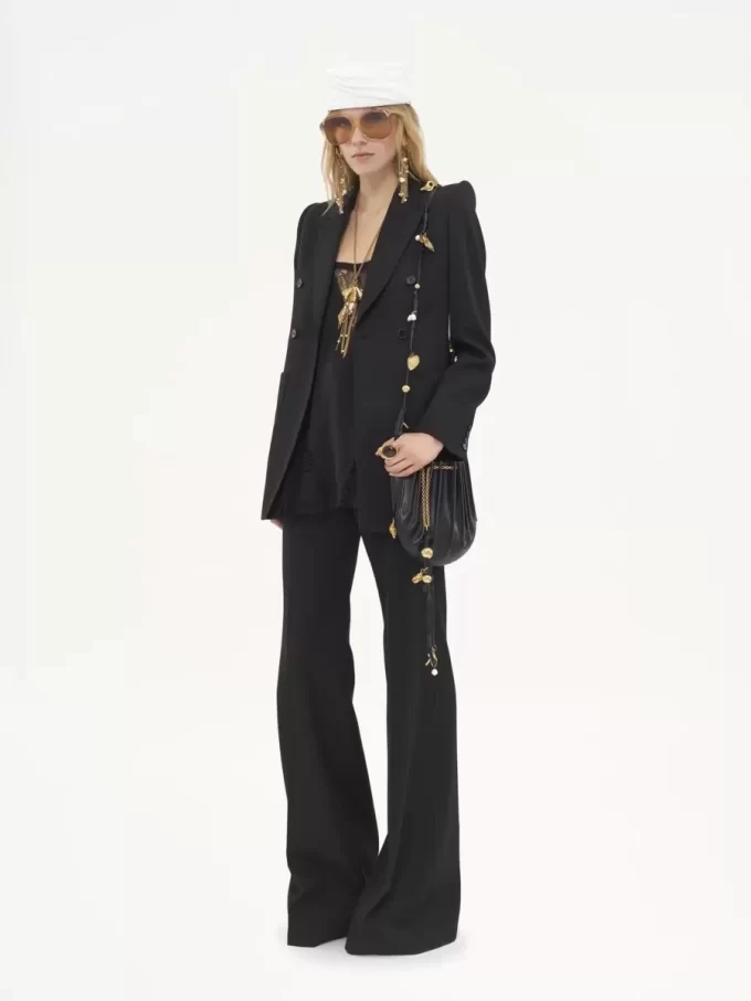 High-rise flared pants in wool grain de poudre High-rise flared pants in wool grain de poudre