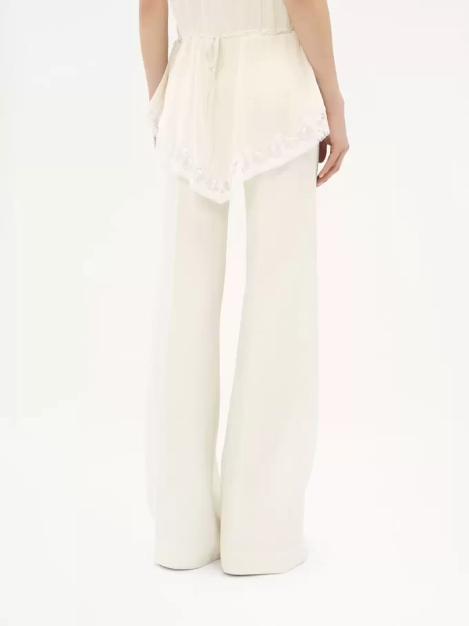 High-rise flared pants in wool grain de poudre High-rise flared pants in wool grain de poudre