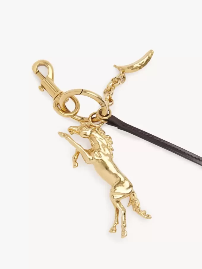 Kerala 25 tag charm in brass Kerala 25 tag charm in brass