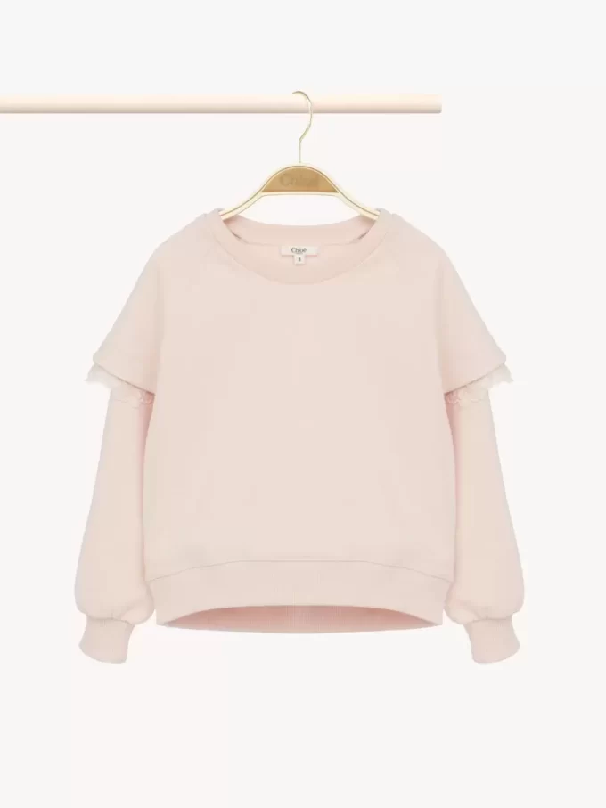 Kids’ ruffled sweater