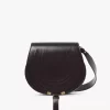 Marcie saddle bag in shiny leather