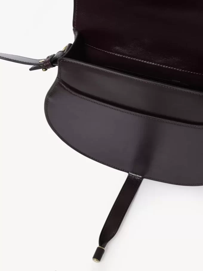 Marcie saddle bag in shiny leather