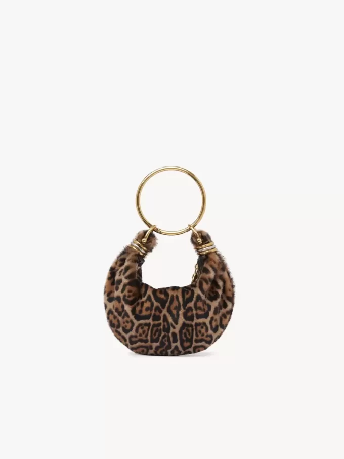 Mini Bracelet Hobo bag in leopard-print shearling Mini Bracelet Hobo bag in leopard-print shearling