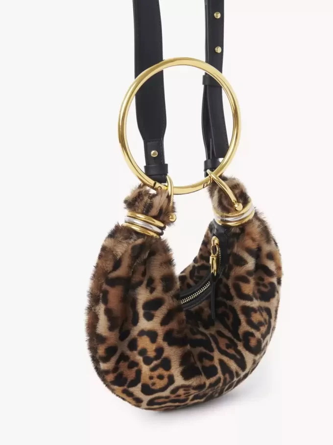 Mini Bracelet Hobo bag in leopard-print shearling Mini Bracelet Hobo bag in leopard-print shearling