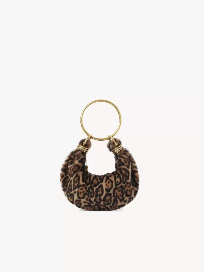 Mini Bracelet Hobo bag in leopard-print shearling Mini Bracelet Hobo bag in leopard-print shearling