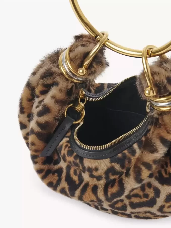 Mini Bracelet Hobo bag in leopard-print shearling Mini Bracelet Hobo bag in leopard-print shearling