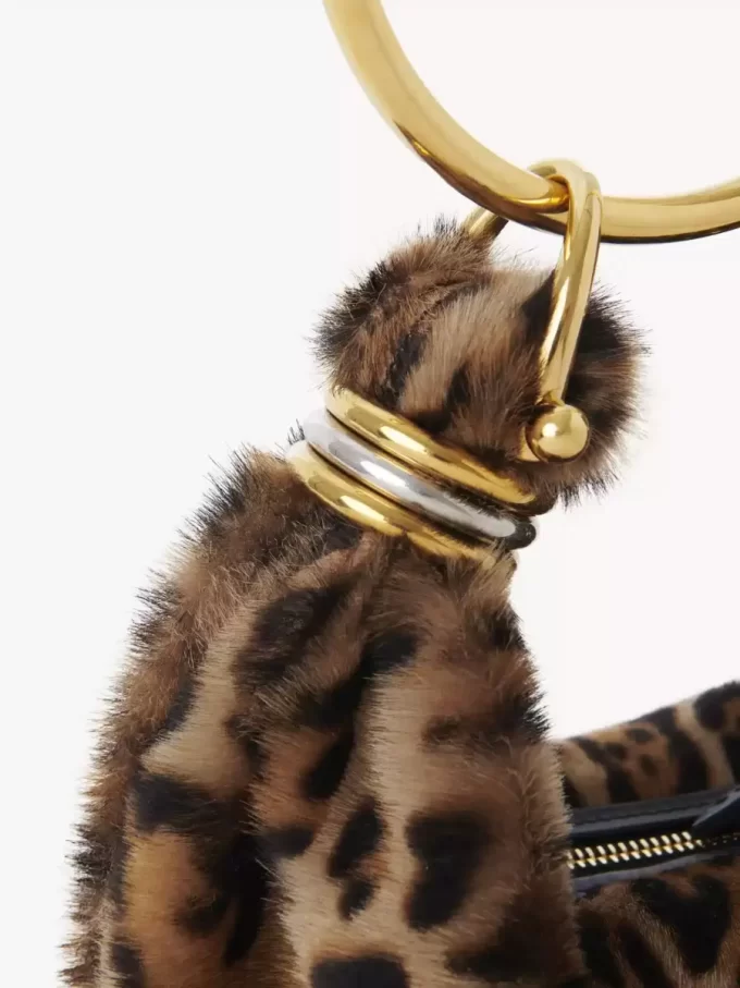 Mini Bracelet Hobo bag in leopard-print shearling Mini Bracelet Hobo bag in leopard-print shearling