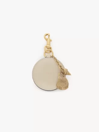 Mirror key ring with shell in shiny leather