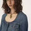 Peplum riding jacket in denim Peplum riding jacket in denim