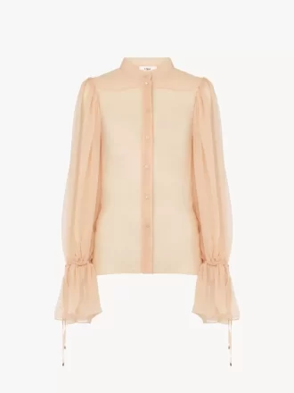 Puff-sleeve blouse in silk mousseline
