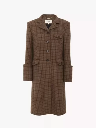 Riding coat in houndstooth wool Riding coat in houndstooth wool