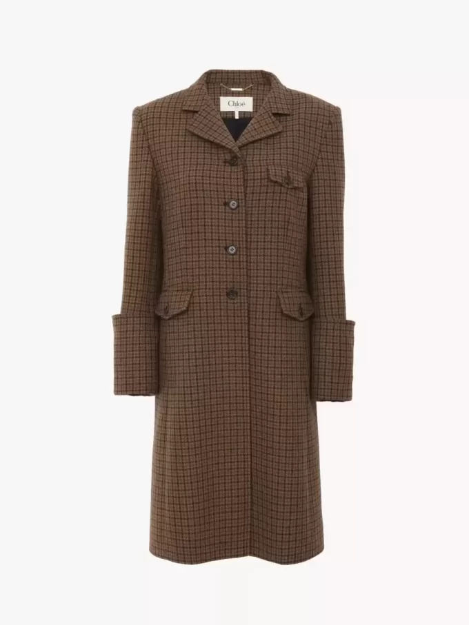 Riding coat in houndstooth wool Riding coat in houndstooth wool